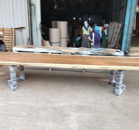 Suar slab on wrapped steel legs in the workshop