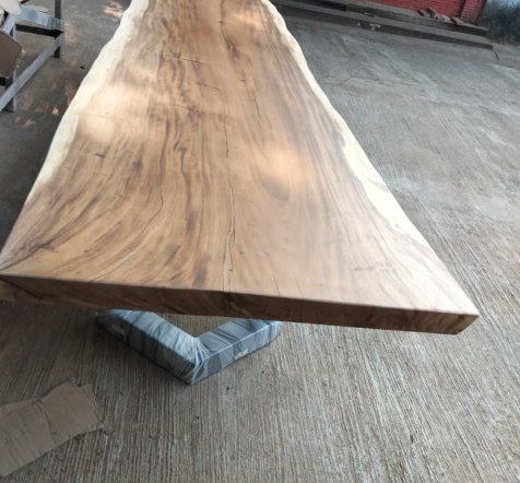 Close view of a UV-coated Suar live edge